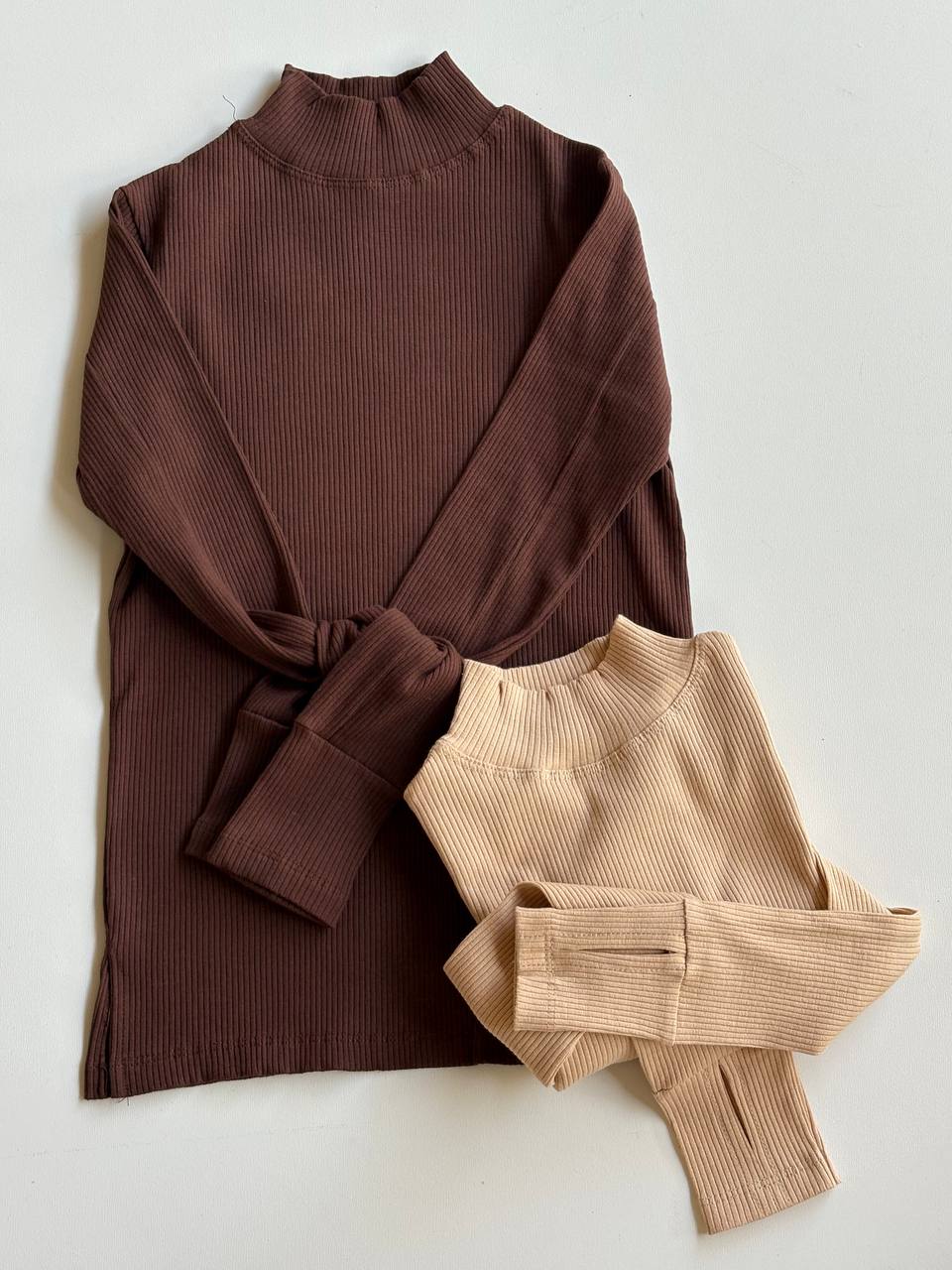 خرید انلاین بلوز زنانه یقه ایستاده استین فینگر